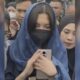 Ini Sosok Wanita Baju Putih di Challenge Baca Surah Ad-Dhuha Berhadiah Miras yang Diamankan Polisi